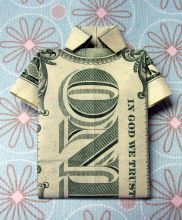 dollar bill folded into a t-shirt
