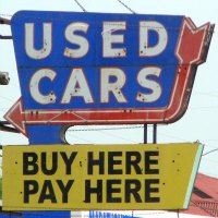 used car buy here pay here sign