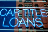 car title loans neon sign in window